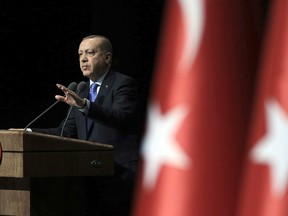 Turkey's President Recep Tayyip Erdogan addresses businessmen in Ankara, Turkey, Monday, Jan. 22, 2018. The Turkish offensive on Afrin, codenamed Operation Olive Branch, started on Saturday, heightening tensions in the already complicated Syrian conflict and threatening to further strain ties between NATO allies Turkey and the United States.