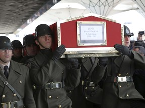 Soldiers carry the flag-draped coffin of Sergeant Musa Ozalkan, the first Turkish soldier to be killed in Turkey's cross-border Operation Olive Branch on a Kurdish held enclave in northern Syria, during a ceremony in Ankara, Turkey, Tuesday, Jan. 23, 2018.  Turkey's president, top army commanders and family members were among those bidding Sergeant Ozalkan a final goodbye Tuesday in the nation's capital.