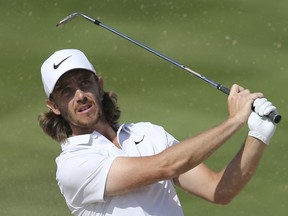 England's Tommy Fleetwood plays a bunker on the 2nd hole during the third round of the Abu Dhabi Championship golf tournament in Abu Dhabi, United Arab Emirates, Saturday, Jan. 20, 2018.