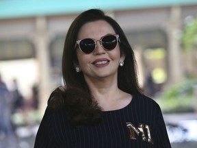 Mumbai Indians team owner Nita Ambani arrives for the first day of the Indian Premier League player auction in Bangalore, India, Saturday, Jan. 27, 2018. The IPL auctions are being held in Bangalore for the eleventh edition of the domestic Twenty20 cricket tournament, which will be held at different venues across the country with eight teams participating.