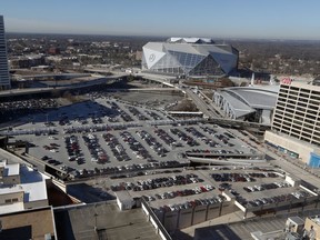 A tract of land known to locals as The Gulch is shown Thursday, Jan. 25, 2018, in Atlanta. As Atlanta vies to entice Amazon to build its second headquarters on the site, local leaders are studying a proposal to build a $5 billion project with more than three times the office space of New York's Empire State Building.