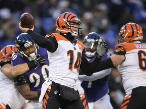 Cincinnati Bengals quarterback Andy Dalton (14) passes the ball during the first half of an NFL football game against the Baltimore Ravens in Baltimore, Sunday, Dec 31, 2017.