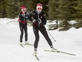 National ski team members Emily Nishikawa, left, and Dahria Beatty, both from Whitehorse, train with the team near Canmore, Alta.