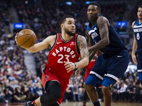 Raptors guard Fred VanVleet drives to the basket against Minnesota Timberwolves' Jamal Crawford during first half NBA action in Toronto on Tuesday night.