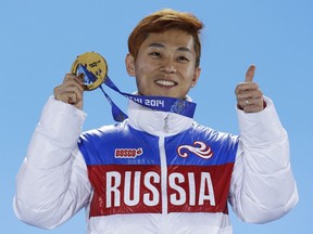 Men's 1,000-metre short track speed-skating gold medallist Viktor Ahn of Russia is seen in a Feb. 15, 2014, file photo. The Russian Olympic Committee says Ahn, a six-time Olympic gold medallist, is among several top Russian athletes barred from the upcoming Pyeongchang Olympics amid the country's ongoing doping scandal.