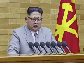 FILE - In this image made from video released by KRT on Jan. 1, 2018, North Korean leader Kim Jong Un speaks in his annual address in undisclosed location, North Korea. North Korea is starting off the new year with a fresh diplomatic initiative aimed at wooing South Korea ahead of its hosting of next month's Winter Olympics. But it's sticking to a decidedly harsh _ and familiar _ message for U.S. President Donald Trump: back off and let Koreans solve their own problems. (KRT via AP Video)