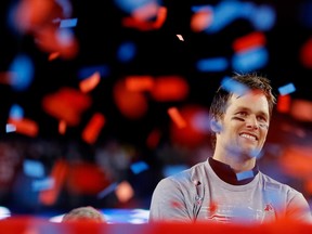 Tom Brady of the New England Patriots celebrates after winning the AFC Championship Game against the Jacksonville Jaguars.