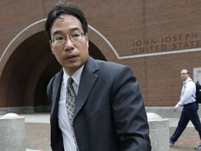 FILE - In this Sept. 19, 2017, file photo, Glenn Chin, supervisory pharmacist at the now-closed New England Compounding Center, leaves federal court in Boston. Chin, a Massachusetts pharmacist charged in a deadly 2012 meningitis outbreak, was cleared in October of second-degree murder charges, but convicted on dozens of other counts. He is scheduled to be sentenced on Wednesday, Jan. 31, 2018.