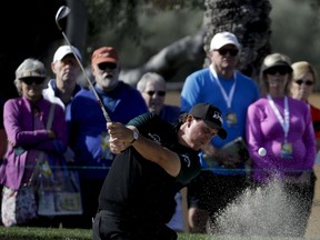 Phil Mickelson hits form the bunker on the sixth hole during first round of the CareerBuilder Challenge golf tournament at La Quinta Country Club Thursday, Jan. 18, 2018, in La Quinta, Calif.