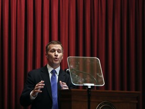 FILE - In this Wednesday, Jan. 10, 2018 file photo, Missouri Gov. Eric Greitens delivers the annual State of the State address to a joint session of the House and Senate, in Jefferson City, Mo. Greitens acknowledges he was "unfaithful" in his marriage but denies allegations that he blackmailed the woman he had an extramarital affair with in 2015 to stay quiet. The Republican governor and his wife released a statement Wednesday night.