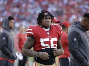 In this Oct. 22, 2017 file photo, San Francisco 49ers linebacker Reuben Foster (56) stands on the sideline during the second half of an NFL football game against the Dallas Cowboys in Santa Clara, Calif. Foster has been arrested in Mississippi and charged with second-degree possession of marijuana. AL.com says the Tuscaloosa County Sheriff's Office arrest database indicates Foster, who just finished his rookie season, was arrested Friday, Jan. 12, 2018.