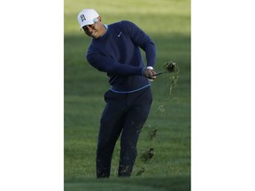 Tiger Woods hits his second shot on the fifth hole of the north course at Torrey Pines Golf Course during the pro-am event at the Farmers Insurance Open golf tournament, Wednesday, Jan. 24, 2018, in San Diego.