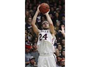 Saint Mary's forward Calvin Hermanson shoots against Portland during the first half of an NCAA college basketball game Saturday, Jan. 27, 2018, in Moraga, Calif.