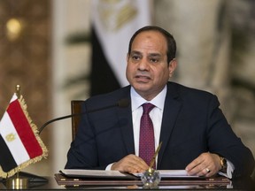 FILE - In this Dec. 11, 2017, file photo, Egyptian President Abdel-Fattah el-Sissi, speaks during a news conference in Cairo, Egypt. On Wednesday, Jan. 31, 2018, a clearly furious el-Sissi gave a thinly veiled but stern warning to opposition politicians calling for a boycott of presidential elections in March, saying he would die first before allowing anyone to mess with the country's security.