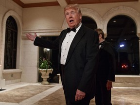 FILE - In this Sunday, Dec. 31, 2017 file photo, President Donald Trump speaks with reporters as he arrives for a New Year's Eve gala at his Mar-a-Lago resort, in Palm Beach, Fla. Trump slammed Pakistan for 'lies & deceit' in a New Year's Day tweet that said Islamabad had played U.S. leaders for 'fools'. 'No more,' Trump tweeted. Meanwhile, Pakistan had no official comment but Foreign Minister Khawaja Asif tweeted that his government was preparing a response that 'will let the world know the truth.'
