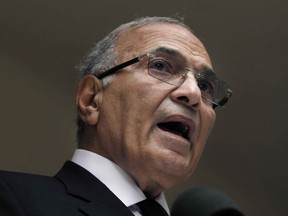 FILE - In this May 26, 2012 file photo, then Egyptian presidential candidate Ahmed Shafiq speaks during a press conference at his office in Cairo, Egypt. Shafiq, an Egyptian former prime minister, says he will not run against President Abdel-Fattah el-Sissi in elections due later in 2018. Shafiq, who served under autocrat Hosni Mubarak, ousted in the 2011 popular uprising, says he isn't the "ideal person" to lead the nation at this point.