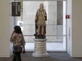 In this photo taken Aug. 23, 2017, a statue of explorer, Christopher Columbus, stands in the lobby of San Jose City Hall in San Jose, Calif. Leaders of Silicon Valley's largest city voted Tuesday, Jan. 30, 2018, to remove the statue of Columbus. The Mercury News reports that the Italian American community has six weeks to find the statue a new home or else it will be put in storage.