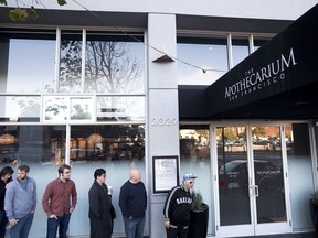 Customers wait for the opening of recreational marijuana sales at The Apothecarium on Saturday, Jan. 6, 2018, in San Francisco. An announcement that the Department of Justice would no longer adopt a "hands-off" approach to legalized marijuana use sent some in the industry into a tailspin just days after the $1 billion California recreational weed market opened for business.