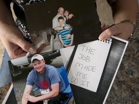 In this photo taken Tuesday, Aug. 29, 2017, Janelle Jones, displays two undated family photos, one showing her late husband, California Correctional Officer Scott Jones, the middle photo showing her, her husband and son Tyler, then age 11, and a copy of the note left by Scott Jones after his 2011 suicide, in her home in Reno, Calif. Scott Jones, who worked at the maximum-security High Desert State prison in northeast California, committed suicide July 8, 2011, leaving a note behind saying "The job made me do it." Suicides are distressingly common among California prison employees.