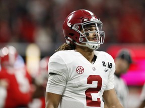 Alabama's Jalen Hurts looks up during the first half of the NCAA college football playoff championship game against Georgia, Monday, Jan. 8, 2018, in Atlanta.