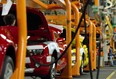 Chevrolet Camaros are assembled at a General Motors plant in Oshawa, Ont., in a file photo from Dec. 16, 2011.