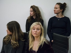 Plaintiffs (left to right) Diana Bentley, Hannah Miller, Kristin Booth and Patricia Fagan attend a press conference after filing lawsuits alleging sexual harassment from Souplpepper Theatre Company director Albert Schultz, in Toronto, on Thursday, January 4, 2018.
