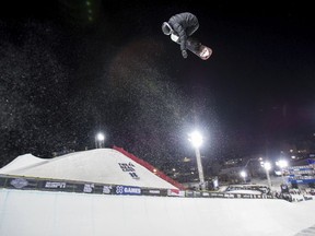 U.S. halfpipe snowboarder Shaun White takes a practice run Wednesday, Jan. 24, 2018, at the Winter X Games in Aspen, Colo.