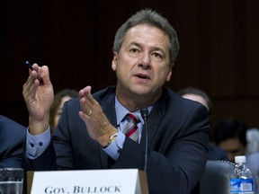 FILE - In this Sept. 7, 2017 file photo, Montana Governor Steve Bullock speaks before a U.S. Senate committee Capitol Hill in Washington. The Democrat signed an executive order Monday prohibiting telecommunications companies from receiving state contracts if they interfere with internet traffic or favor higher-paying sites or apps.