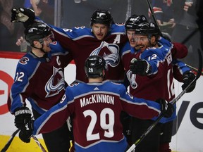 Colorado Avalanche defenseman Erik Johnson (6) celebrates his goal with teammates Gabriel Landeskog (92), Nathan MacKinnon (29), Patrik Nemeth (12), and Mikko Rantanen (96) against the New York Rangers in the first period of an NHL hockey game in Denver on Saturday, Jan. 20, 2018.