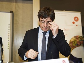 Ousted Catalan leader Carles Puigdemont takes part in a debate at the Political Science Department at the University of Copenhagen on  Monday Jan. 22, 2018 . The fugitive former leader of Catalonia has arrived in Denmark, despite threats from Spain to seek his immediate arrest there. Puigdemont is being investigated by Spain over a unilateral declaration of independence by Catalonia's parliament on Oct. 27.