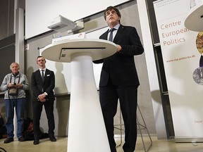 Ousted Catalan leader Carles Puigdemont takes part in a debate at the Political Science Department at the University of Copenhagen on  Monday Jan. 22, 2018 . The fugitive former leader of Catalonia has arrived in Denmark, despite threats from Spain to seek his immediate arrest there. Puigdemont is being investigated by Spain over a unilateral declaration of independence by Catalonia's parliament on Oct. 27.