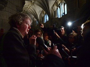 Ethics Commissioner Mary Dawson speaks to reporters after appearing as a witness at a commons committee on Parliament Hill, in Ottawa on Tuesday, October 17, 2017. The federal ethics commissioner â€" on her last day in office â€" cleared Finance Minister Bill Morneau of allegations that he and his father benefited from insider information to save half a million dollars on the sale of shares in their family-built company.