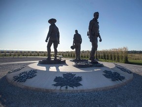 The monument honouring RCMP Constables Fabrice Gevaudan, Dave Ross and Doug Larche, gunned down in 2014, is seen in Moncton on Friday, Sept. 29, 2017. The RCMP has been ordered to pay $550,000 for failing to provide its members with proper equipment and training in the wake of a fatal shooting rampage four years ago in Moncton.