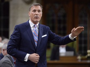 Quebec member of Parliament Maxime Bernier, who finished a close second to Andrew Scheer in last year's Conservative Party leadership vote, says he wants to know why disgraced former MP Rick Dykstra was allowed to run in the 2015 election. Bernier rises during question period in the House of Commons on Parliament Hill in Ottawa on Thursday, Sept.28, 2017.
