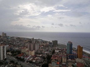 A coastal view of Havana, Cuba is shown on Sunday, May 24, 2015. A senior Global Affairs official says eight Canadians required followup medical care after diplomats and family members in Cuba suffered unexplained ailments.