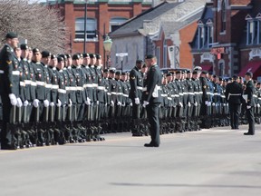 Soldiers prepare to march to commemorate the 100th anniversary of the Vimy Ridge battle in Kingston, Ont., on Sunday April 9, 2017. The Canadian military has reversed what had become a worrying trend by reporting a small increase in the number of people in uniform last year - though it is has long way to go to fill all the holes in its ranks.