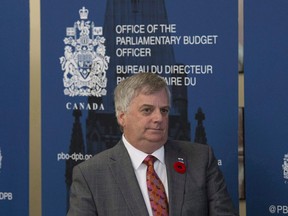 Parliamentary Budget Officer Jean-Denis Frechette is seen before speaking with the media, in Ottawa on November 1, 2016. A new report estimates proposed opposition legislation to resurrect the per-vote subsidy for federal political parties would cost the public treasury about $44 million annually over the next four years. The parliamentary budget officer is crunching the potential taxpayer costs of reintroducing the subsidy, which was introduced in 2004 by the Liberals when corporate donations were banned. By 2015, however, the Conservatives had phased out the subsidies.