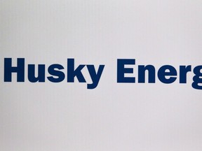 Husky Energy logo is shown at the company's annual meeting in Calgary, Alta., Friday, May 5, 2017. Shares in Calgary-based Husky Energy Inc. (TSX:HSE) fell by as much as 7.7 per cent on Thursday morning after its SeaRose FPSO vessel off the Newfoundland and Labrador coast was ordered suspended by the federal-provincial regulator because of a close call with an iceberg last March.
