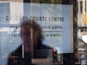 An entrance to the Calgary Courts Centre is shown in Calgary on Friday, Aug. 27, 2010. A young man who says he was sexually assaulted by a former longtime employee of a young people's performance group has testified that Philip Heerema held a position of power in the Calgary troupe.THE CANADIAN PRESS/Jeff McIntosh