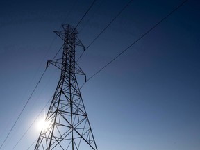 A hydro tower is seen in Toronto on Wednesday, November 4, 2015. The Manitoba government says a new Crown corporation aimed at promoting energy efficiency will be up and running later this year.