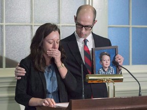Carly Sutherland and her husband John Sutherland address a news conference at the legislature in Halifax on Thursday, Nov. 30, 2017. A Nova Scotia mother is sharing heartbreaking details about her family's plight in caring for their nine-year-old son with severe autism who suffers from violently aggressive fits ??? an effort to prod governments to do more for families in similar situations.