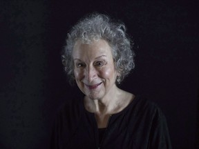 Author Margaret Atwood poses for a photo as she promotes "Alias Grace," at the Toronto International Film Festival, in Toronto on September13, 2017. Another series inspired by Canadian author Margaret Atwood's writing is on the horizon. Anonymous Content and Paramount Television say they've acquired the rights to develop a series based on Atwood's dystopic trilogy "Oryx and Crake," "The Year of the Flood" and "MaddAddam."