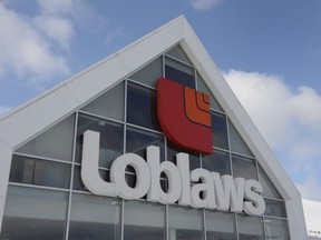 A Loblaws store is seen March 9, 2015 in Montreal. An Ontario judge has ruled today that it is too early to determine the enforceability of Loblaw Companies Ltd.'s policy that anyone who receives a $25 gift card from the company waives their right to that sum of possible future settlement money from a bread price-fixing scheme class-action lawsuit.