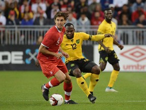 Team Canada's Dejan Jakovic, left, takes possession of the ball from Team Jamaica's Michael Binns during the first half of their international friendly soccer game in Toronto on September 2, 2017. Expansion Los Angeles FC has signed Canadian international defender Dejan Jakovic. The 32-year-old centre back played in the NASL for the New York Cosmos last season. He spent five seasons in MLS at D.C. United from 2009 to 2013, sandwiched between stints with Serbia's Red Star Belgrade and Japan's Shimizu S-Pulse.