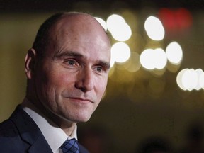 Jean-Yves Duclos, Minister of Families, Children and Social Development, speaks to reporters at a Liberal cabinet retreat in Calgary, Alta., Tuesday, Jan. 24, 2017. Canadians made to jump administrative hurdles to fight federal benefit decisions are being told that their needs will be the focus of a revamped social security tribunal.