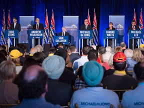 B.C. Liberal leadership candidates Todd Stone, from left to right, Andrew Wilkinson, Sam Sullivan, Mike de Jong, Dianne Watts and Michael Lee participate in the first leadership debate in Surrey, B.C., on Sunday October 15, 2017. The contest to replace Christy Clark as leader of British Columbia's Liberal party is in its stretch run with the race coming down to a choice between the old guard and party newcomers.