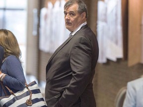 Closing arguments will continue in Quebec today at the jury trial of three men charged with criminal negligence in the Lac-Megantic rail disaster that killed 47 people. Traffic controller Richard Labrie leaves the courtroom during a break on the second day of jury selection, Tuesday, September 12, 2017 in Sherbrooke, Que. Three ex-railway employees - train driver Thomas Harding, and Jean Demaitre, manager of train operations and Labrie - face 47 counts of criminal negligence causing death stemming from the 2013 railway crash in Lac Megantic Quebec that killed 47 people.THE CANADIAN PRESS/Ryan Remiorz