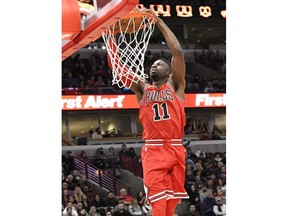 Chicago Bulls guard David Nwaba (11) dunks the ball against the Portland Trail Blazers during the first half of an NBA basketball game, Monday, Jan. 1, 2018, in Chicago.