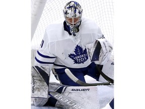 Toronto Maple Leafs goalie Frederik Andersen blocks a shot against the Chicago Blackhawks during the first period of an NHL hockey game Wednesday, Jan. 24, 2018, in Chicago.