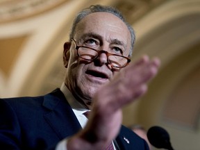 Senate Minority Leader Sen. Chuck Schumer of N.Y., speaks to reporters following a Senate policy luncheon on Capitol Hill in Washington, Tuesday, Jan. 23, 2018.